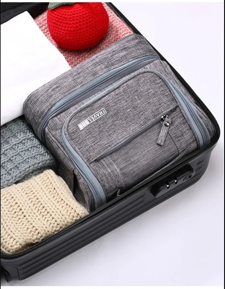 Trousse de toilette femme grise – suspendue, étanche, voyage