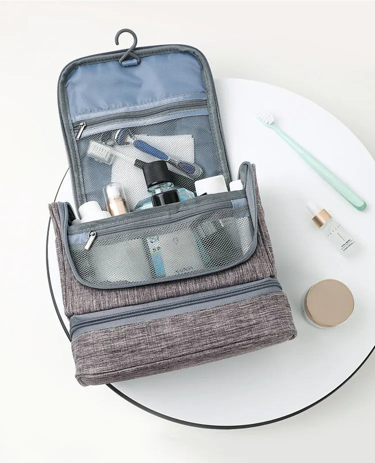 Trousse de toilette femme grise – suspendue, étanche, voyage
